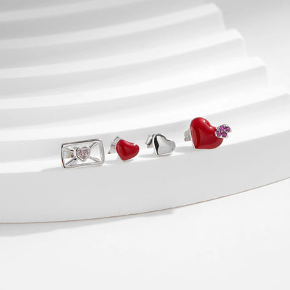 Beautiful and delicate earrings in 925 sterling silver with red heart and mirror