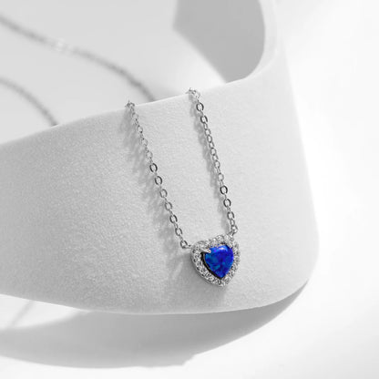 925 sterling silver necklace with delicate dark blue opals and earrings and ring